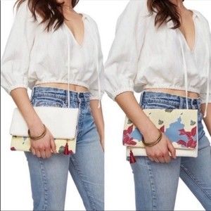 RACHEL Pally floral clutch with beauty samples